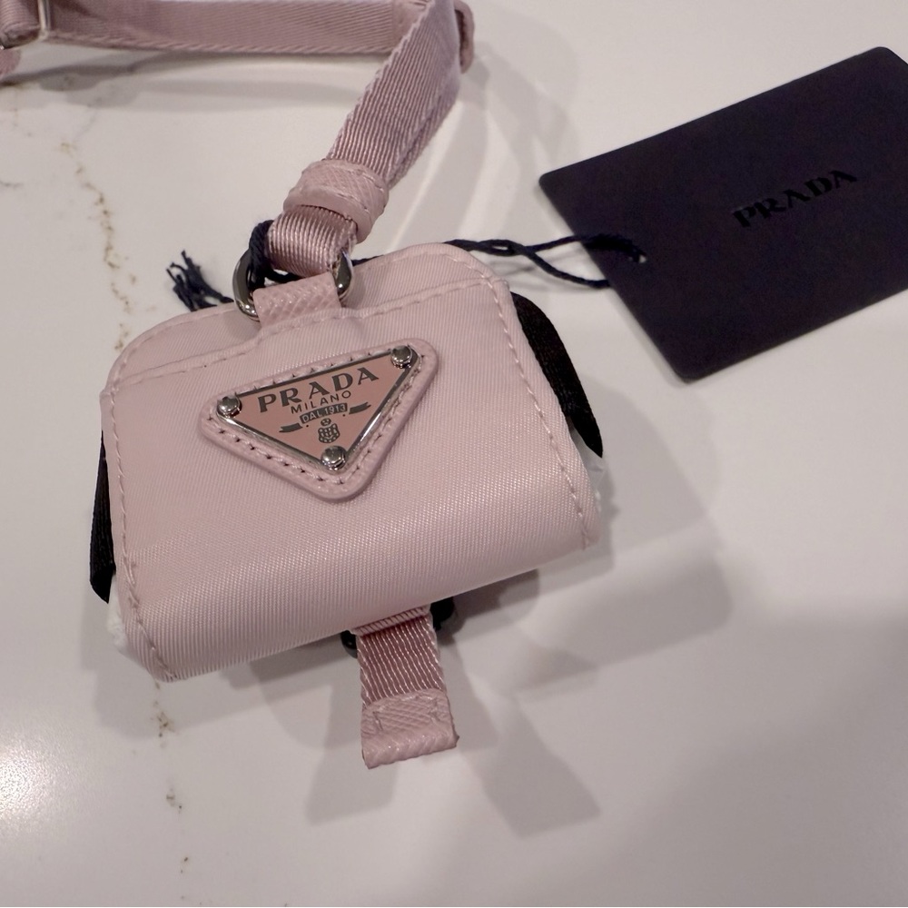 PRADA 
Tessuto Nylon Metal Triangle Airpods Pro Case Alabastro